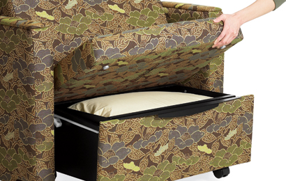 Ventilated storage box for pillows and bedding in the bottom of the chair sleeper bed frame.