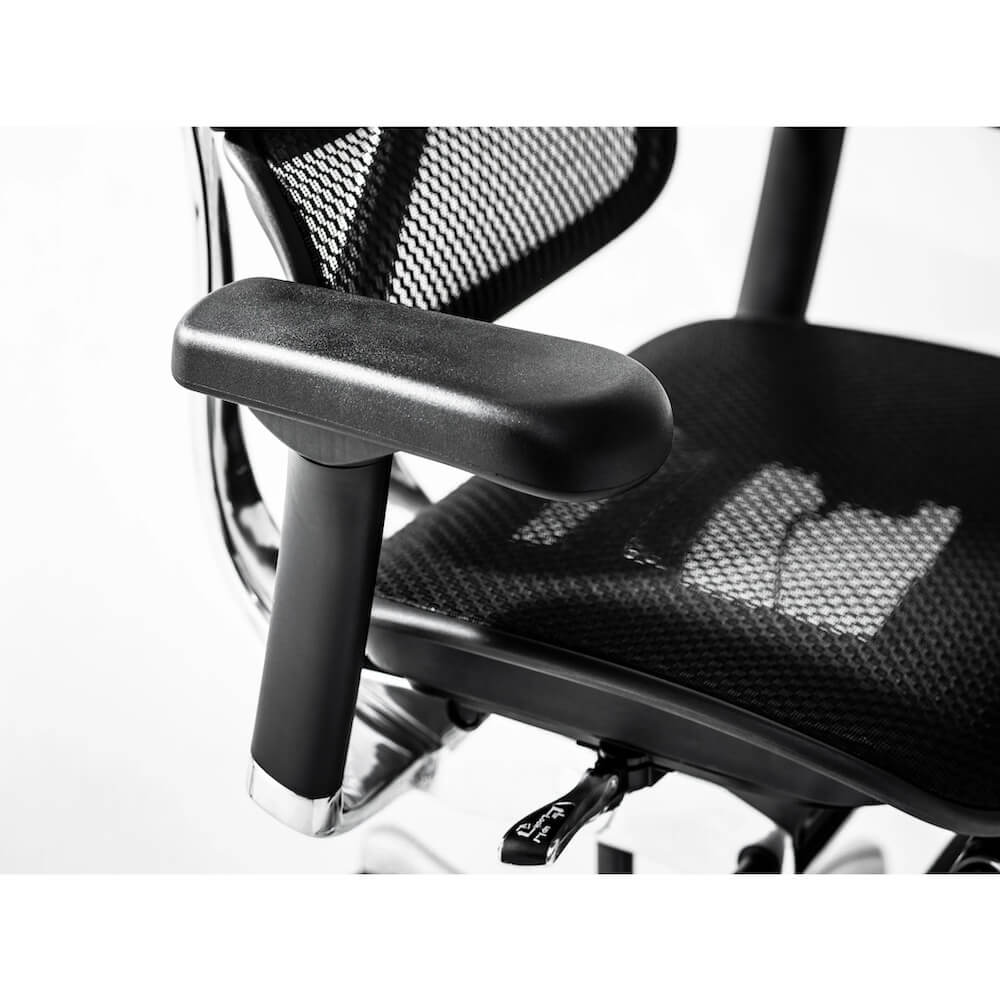 Office furniture chairs office desk chairs ergonomic executive office chair armrests close up 1