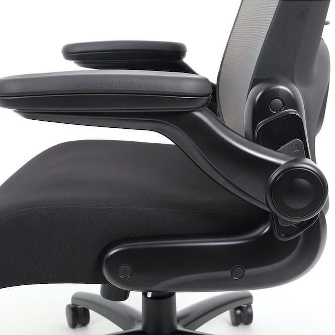 Office furniture chairs office desk chairs office chair with flip up armrests side close up Office furniture chairs office desk chairs office chair with flip up armrests side close up