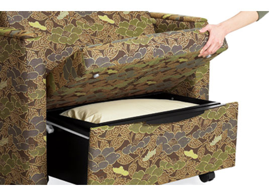 Ventilated storage box for pillows and bedding in the bottom of the chair sleeper bed frame.