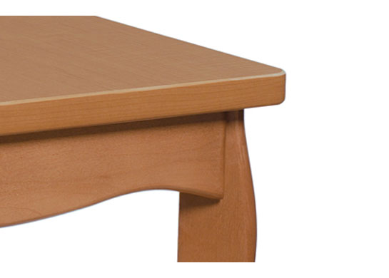 Laminate top with coordinating 3mm polymer edge and York style leg. Shown in Tiger Fruitwood (TFM). Customizable healthcare furniture.