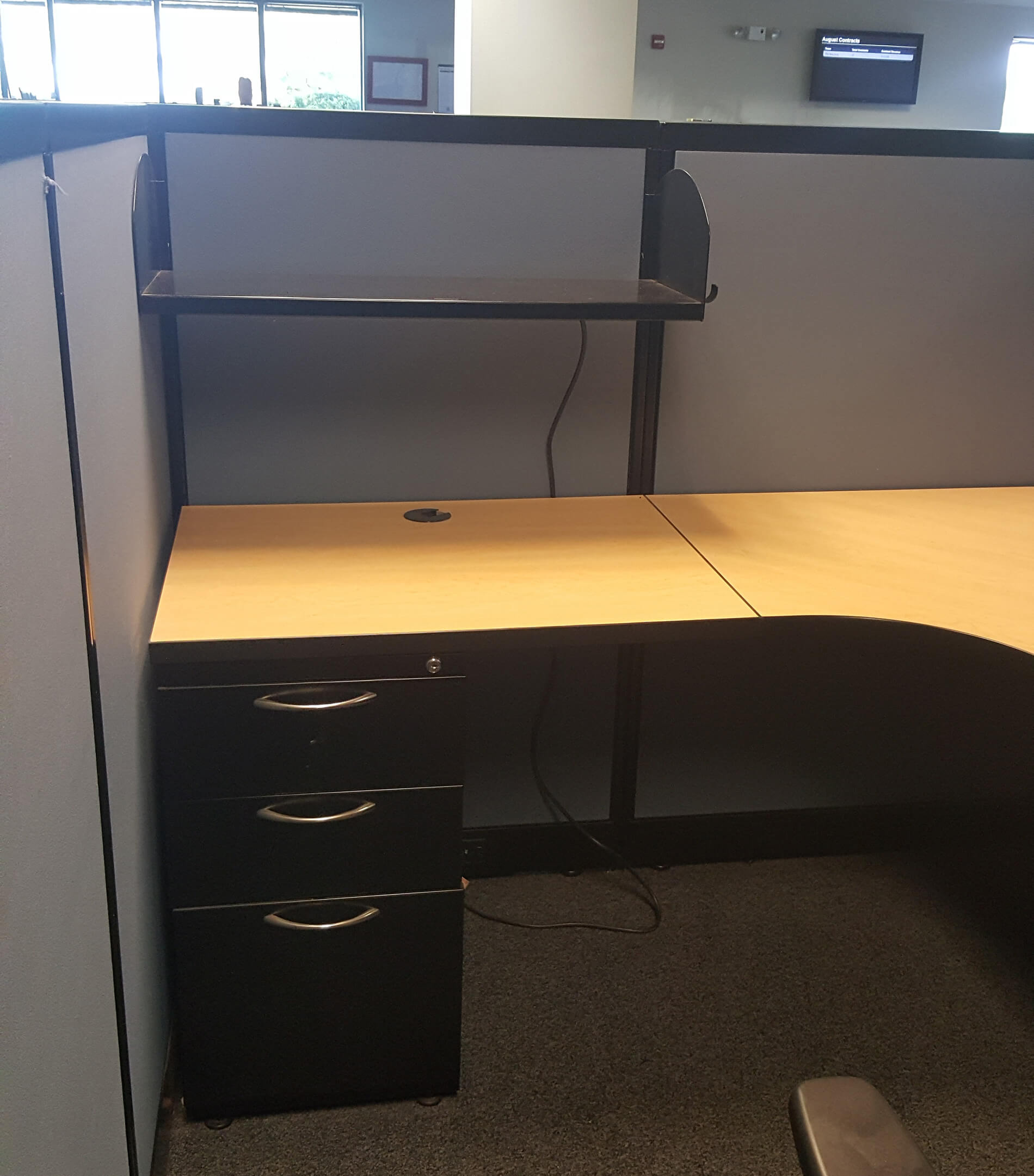These used cubicles include a 3 drawer filing unite and an open shelf.