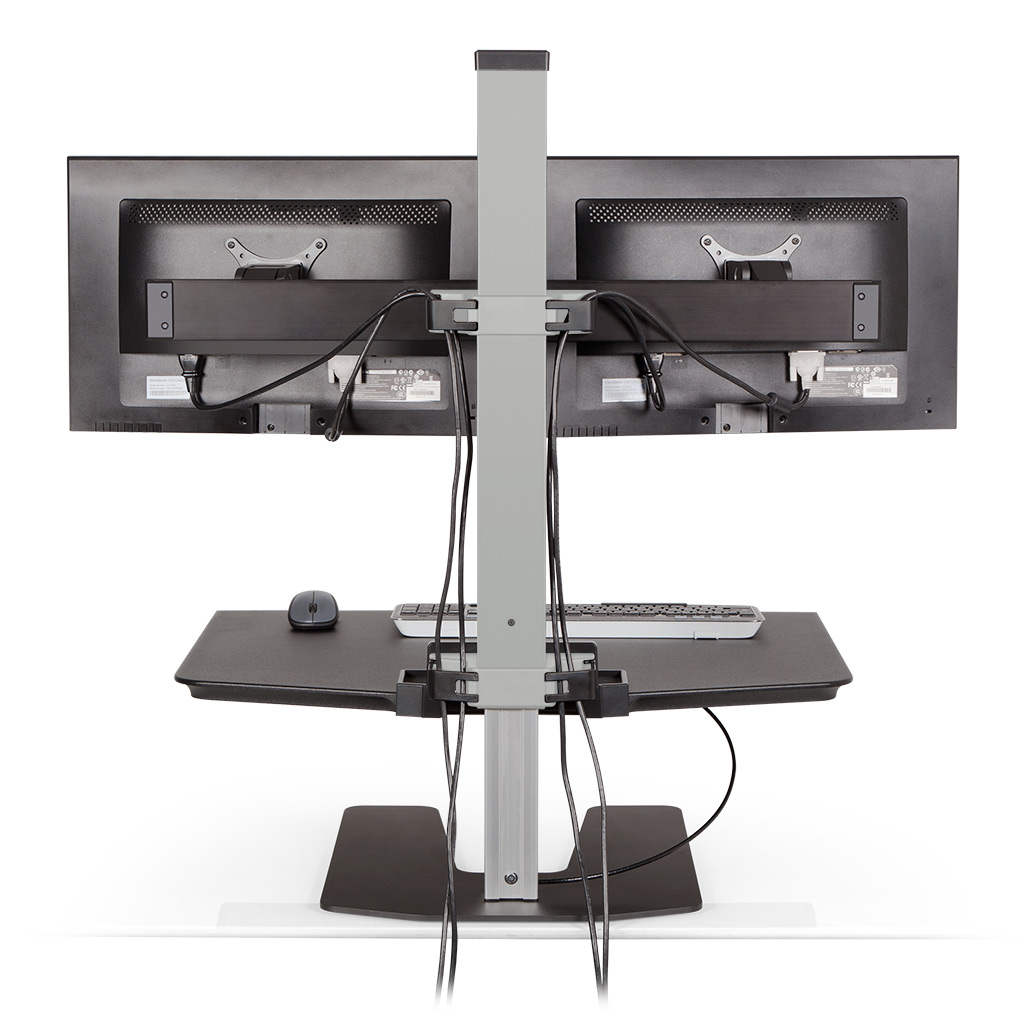 Stand Sit Desk Conversion Kit from LCD Arms - Cable management. Cable clips in the column and beam keep the cables organized and out of the way. Stand Sit Desk Conversion Kit from LCD Arms - Cable management. Cable clips in the column and beam keep the cables organized and out of the way.